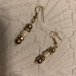 Gold earrings with Diamond like embellishments